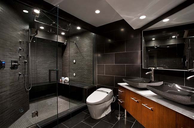 A newly remodeled modern bathroom in Anoka County, MN, featuring sleek fixtures and a stylish vanity.